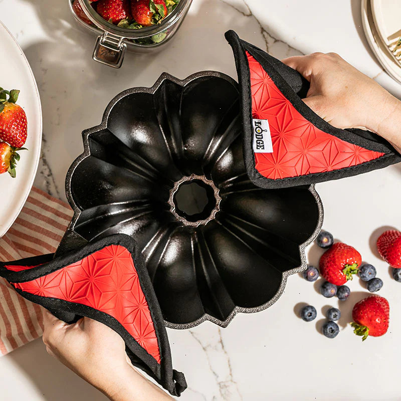 Cast Iron Fluted Cake Pan with Red Potholders - View 2